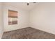 This bedroom features neutral walls, window with a blind, and a ceiling fan at 1627 W Maplewood St, Chandler, AZ 85286