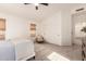 Bright bedroom featuring a ceiling fan, carpet flooring, and a closet at 1627 W Maplewood St, Chandler, AZ 85286