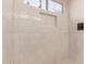 Shower with white subway tile and a soap nook at 1627 W Maplewood St, Chandler, AZ 85286