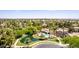 Scenic view featuring the community's pool, pond, landscaping, and desert views against a clear blue sky at 1925 W Olive Way, Chandler, AZ 85248