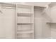 Empty closet with multiple shelves and clothing rods for organization at 1925 W Olive Way, Chandler, AZ 85248
