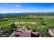 Scenic aerial view of the golf course and surrounding community with mountain views at 20750 N 87 St # 2103, Scottsdale, AZ 85255