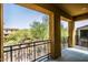 Outdoor balcony overlooking lush greenery, offering a serene view at 20750 N 87 St # 2103, Scottsdale, AZ 85255