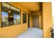 Long balcony with windows, a ceiling fan, and a view of the neighborhood at 20750 N 87 St # 2103, Scottsdale, AZ 85255