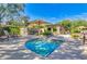 Inviting community hot tub with shaded seating areas and lush landscaping, perfect for relaxation at 20750 N 87 St # 2103, Scottsdale, AZ 85255