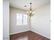 Cozy dining area with a chandelier and natural light from a window at 20750 N 87 St # 2103, Scottsdale, AZ 85255