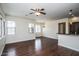 Bright living area featuring hardwood floors and large windows at 20750 N 87 St # 2103, Scottsdale, AZ 85255