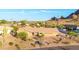 Aerial view of desert home showing the rock butte in the background at 2319 N 58Th St, Scottsdale, AZ 85257