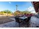 Relaxing outdoor dining area on a brick-paved patio with desert mountain views at 2319 N 58Th St, Scottsdale, AZ 85257