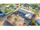 Aerial view of a private backyard with desert landscaping and a cozy seating area at 2319 N 58Th St, Scottsdale, AZ 85257