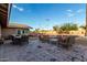 Outdoor living with patio furniture and a brick-paved area surrounded by desert landscaping at 2319 N 58Th St, Scottsdale, AZ 85257