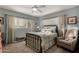 Serene bedroom with a brass bed, plush armchair, and soft lighting at 2319 N 58Th St, Scottsdale, AZ 85257
