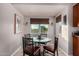 Bright breakfast nook with a cozy round table and natural window light at 2319 N 58Th St, Scottsdale, AZ 85257