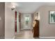 Bright entryway featuring neutral walls, modern lighting, and decorative accents at 2319 N 58Th St, Scottsdale, AZ 85257