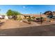 Charming single-story home featuring desert landscaping and a well-maintained exterior at 2319 N 58Th St, Scottsdale, AZ 85257