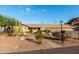 Inviting single-story home with desert landscaping and a clear blue sky above at 2319 N 58Th St, Scottsdale, AZ 85257