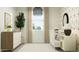 Bright Bedroom with a large window, modern dresser, and a crib at 23361 W Atlanta Ave, Buckeye, AZ 85326