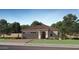 Inviting single-story home with a well-manicured lawn, tiled roof, and a convenient two-car garage at 23361 W Atlanta Ave, Buckeye, AZ 85326