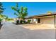 Charming single-story home featuring a well-manicured lawn and mature trees at 2350 E Melrose St, Gilbert, AZ 85297