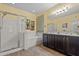 Bathroom with a separated shower and bathtub, double sink vanity, and tile flooring at 2422 W Maya Way, Phoenix, AZ 85085