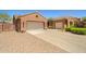 Charming single-story home featuring a two-car garage and a spacious driveway at 2422 W Maya Way, Phoenix, AZ 85085