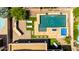 Aerial view featuring a sparkling pool, spa, and lounge area creating an inviting outdoor space at 2460 E Crescent Way, Gilbert, AZ 85298