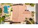 Birds-eye view of home with a pristine pool, lounge chairs, and manicured landscaping at 2460 E Crescent Way, Gilbert, AZ 85298