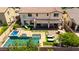 Expansive backyard featuring a sparkling pool, spa, and covered patio for relaxing and entertaining at 2460 E Crescent Way, Gilbert, AZ 85298