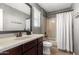 Bathroom featuring a shower-tub combo and a vanity at 2460 E Crescent Way, Gilbert, AZ 85298