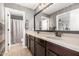 Bathroom featuring double sinks and a large mirror at 2460 E Crescent Way, Gilbert, AZ 85298