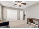 Bedroom featuring a ceiling fan and a desk at 2460 E Crescent Way, Gilbert, AZ 85298