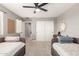 Bright bedroom with two daybeds and a ceiling fan at 2460 E Crescent Way, Gilbert, AZ 85298