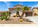Beautiful two-story home with desert landscaping, including palm trees and cacti at 2460 E Crescent Way, Gilbert, AZ 85298