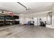Spacious garage with ample storage and shelving at 2460 E Crescent Way, Gilbert, AZ 85298