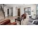 Inviting living room showcasing a cozy seating area and a large window at 2460 E Crescent Way, Gilbert, AZ 85298