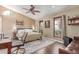 Bright bedroom with hardwood floors, vaulted ceiling, and warm accents at 24813 N 55Th Dr, Glendale, AZ 85310