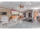 Garage transformed into a well-organized home gym with exercise equipment and storage at 24813 N 55Th Dr, Glendale, AZ 85310