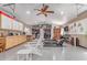 Home gym in the garage includes work out equipment and ample storage space at 24813 N 55Th Dr, Glendale, AZ 85310