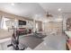 Spacious garage converted to a home gym with various exercise equipment and ample space at 24813 N 55Th Dr, Glendale, AZ 85310
