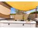 Close up of a backyard hot tub with partial sun shade, perfect for relaxation at 24813 N 55Th Dr, Glendale, AZ 85310