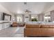 Bright living area with plush seating, modern decor, and lots of natural light at 24813 N 55Th Dr, Glendale, AZ 85310
