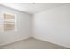 Bright bedroom with natural light and neutral carpeting at 25096 N 154Th Ln, Surprise, AZ 85387