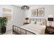 Stylish bedroom featuring modern decor, neutral accents, and warm natural light at 25096 N 154Th Ln, Surprise, AZ 85387