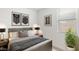 Comfortable bedroom with a calm vibe, featuring neutral colors and warm natural light at 25096 N 154Th Ln, Surprise, AZ 85387