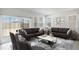 Inviting living room filled with natural light, featuring modern decor and comfortable seating at 25096 N 154Th Ln, Surprise, AZ 85387