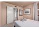 Relaxing bedroom with a closet, door, and window provides plenty of natural light at 2716 S Terrace Rd, Tempe, AZ 85282