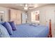 Comfortable bedroom with ceiling fan, en suite bath and spacious closet for optimal storage at 2716 S Terrace Rd, Tempe, AZ 85282