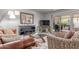 Cozy living room with a glass coffee table and sliding door to patio at 2716 S Terrace Rd, Tempe, AZ 85282