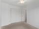 Bright bedroom features carpet, closet, and a ceiling fan at 330 S Valley Dr, Apache Junction, AZ 85120