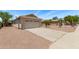 Charming single-level home with a two-car garage and a long driveway in a friendly neighborhood at 330 S Valley Dr, Apache Junction, AZ 85120